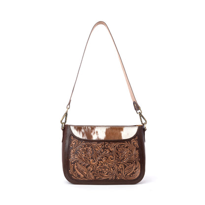Myra Copper Crest Handtooled Hairon Leather Clutch in Saddle Walnut